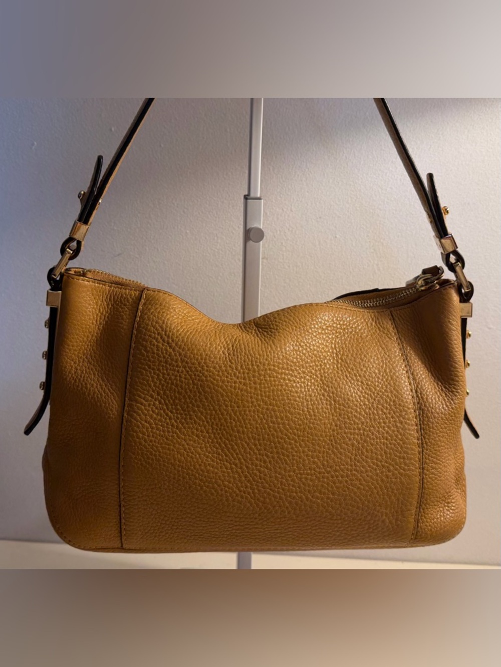 Michael Michael Kors Bowery small camel colored pebbled leather shoulder bag.